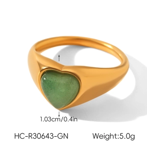 Close-up of golden stainless steel heart ring with 1.03cm green natural stone