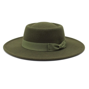 Flat top dark green wool felt boater hat with matching ribbon bow and wide brim
