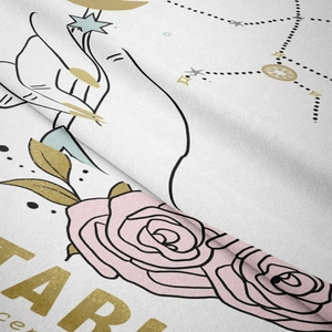 Macro shot showing soft texture and detailed rose floral print on the bohemian tapestry