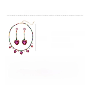 Detail view of heart-shaped zircon necklace and tassel earrings set in gold plating
