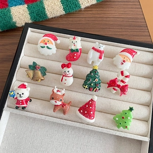 Glittery Christmas resin charms featuring Santa, reindeer and tree in display box