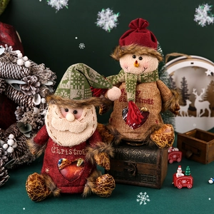 Charming Santa and Snowman Christmas gift bags in burlap with festive heart window