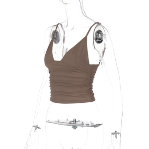 Detail of brown V-neck crop top with ruched fabric design on transparent mannequin