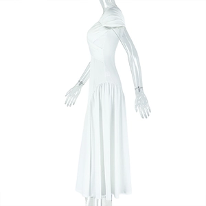 Detail of white pleated A-line dress with slim fit and elegant sleeveless backless design