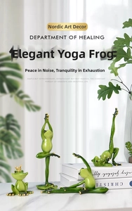 Detail of four green yoga frog figurines with golden crowns and polished resin finish
