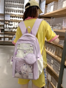Cute high-capacity purple and beige school backpack for girls with mesh front pocket