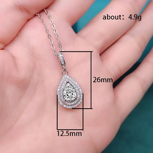 Elegant olive green teardrop necklace with double halo crystal pendant on silver chain