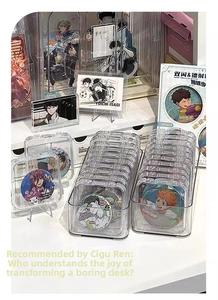 Detailed view of clear acrylic display boxes with tiered stands for badge collections