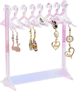 Macro view of colorful acrylic earring display rack with mini clothes hanger hooks