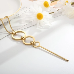 Vintage golden stainless steel geometric circle pendant necklace for women shown on white background