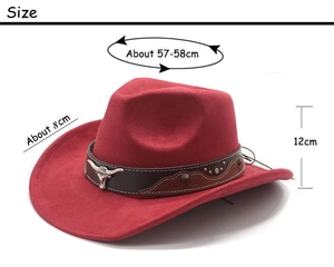 Detail of red faux suede cowboy hat showing leather band and metallic bull logo