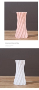 Macro view of spiral texture on modern pink and white ceramic vases for home decor