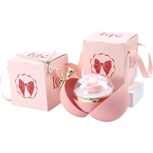 Pink heart-themed flower gift box with rose ornament and Love typography print
