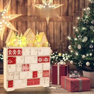 Close-up of LED lit wooden Christmas advent calendar with numbered countdown drawers