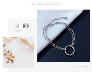 Detail showing S925 sterling silver stamp on double-layer round pendant bracelet