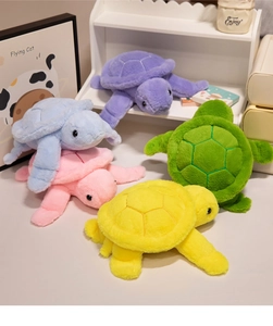 Close-up of soft plush turtle pillows in colorful purple, pink, and green variety