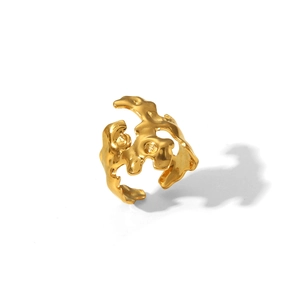 Makroaufnahme der Lava-Textur und des goldenen Glanzes auf dem verstellbaren offenen Ring