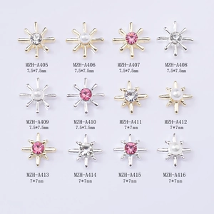 12-piece set of star-shaped metal nail charms with rhinestones and pearls for DIY nail art