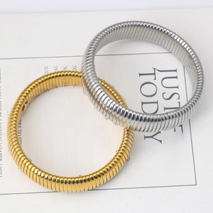 Polished gold and silver stainless steel tubogas stretch bracelets with ribbed texture