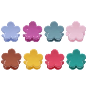 Detail of 8-piece flower hair clips set in various vibrant colors on white background