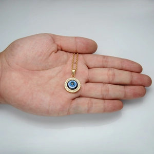 Collier en acier inoxydable plaqué or 18 carats avec pendentif œil maléfique en cristal