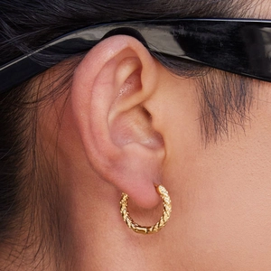 14K gold plated stainless steel hoop earrings featuring a stylish twisted woven texture