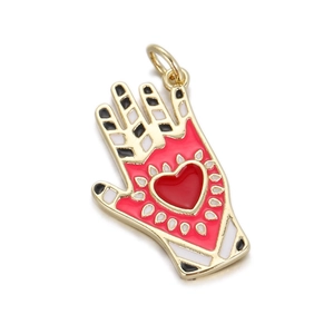 Macro detail of Hamsa Hand pendant with red heart and colorful enamel inlay