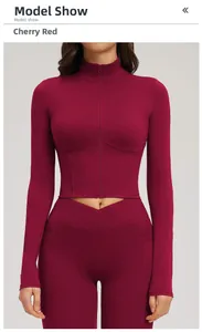 Detail of cherry red yoga top with stand collar and sleek high-waisted leggings