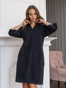 Close-up of navy blue corduroy midi dress with V-neckline and elegant long sleeves