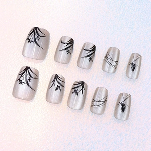 Cat eye short square press-on nails with silver grey shimmer and black ink art