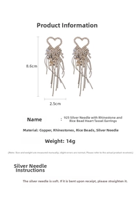 Detailed size view of heart tassel earrings with dimensions 8.6cm x 2.5cm and 14g weight