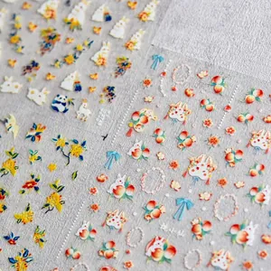Cute rabbit and peach nail art stickers with floral designs for summer DIY manicures