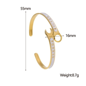 Detail view of wrench-shaped 18K gold plated bracelet with dimensions 55mm and 16mm