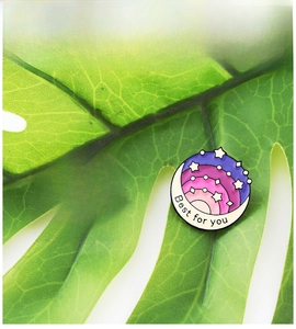 Detail of round Good Vibes Only and crescent Best for you colorful enamel lapel pins
