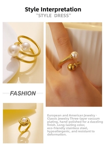 Detailed macro view of 18k gold plated stainless steel pearl ring with polished finish