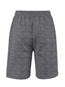 Detail view of grey knitted jacquard fabric shorts featuring rear pocket and elastic waistband