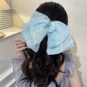 Elegant large light blue mesh bow hair clip with pearlescent finish for women