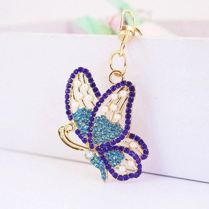Sparkling rhinestone butterfly keychain with faux pearls and blue turquoise stones