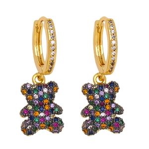 Chic gold huggie earrings with colorful pave zircon teddy bear charms on white background