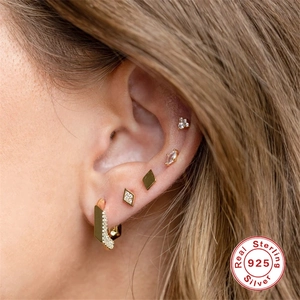Set of four gold 925 sterling silver stud earrings with marquise and round cubic zirconia