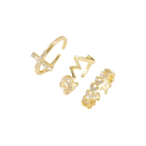 Three-piece gold adjustable ring set featuring cross and heart designs with cubic zirconia