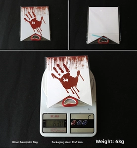 Detail view of bloody handprint banner packaging and 63g weight on a scale