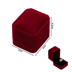 Macro view of a red velvet ring box with dimensions 6x5x4.5cm on a white background