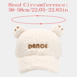 Detail of white plush baseball cap with bear ears and DANCE letter embroidery