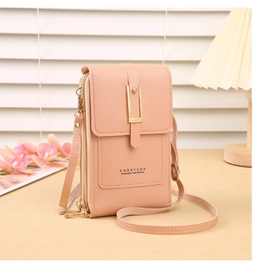 Detail view of pink PU leather crossbody phone bag with three-zipper storage layers
