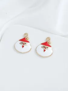Detail view of red and white enamel Santa Claus charms for DIY jewelry making