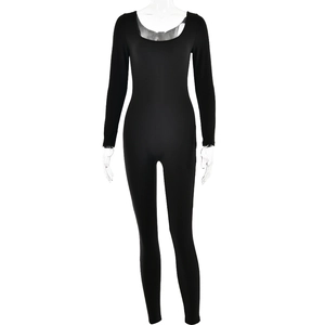 Detail view of the black long sleeve bodysuit with a deep U-neck and form-fitting cut