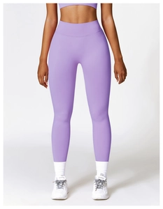 Close-up of high-waisted lavender yoga pants showing seamless texture and squat-proof fabric