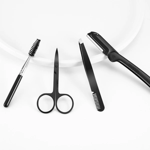 4-piece black stainless steel eyebrow grooming set with scissors and folding razor