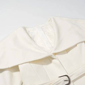 Elegant white wool coat with stylish lapel collar and matching belted waist detail
